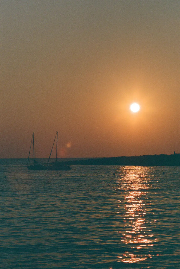 Sailing into the Sunset – Tranquil Waters