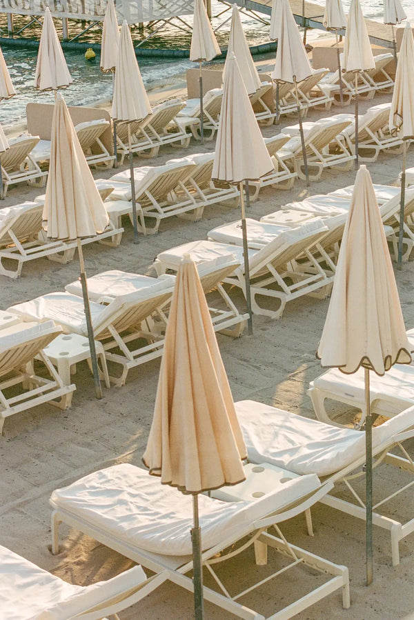 Tranquil Beach Loungers at Sunset